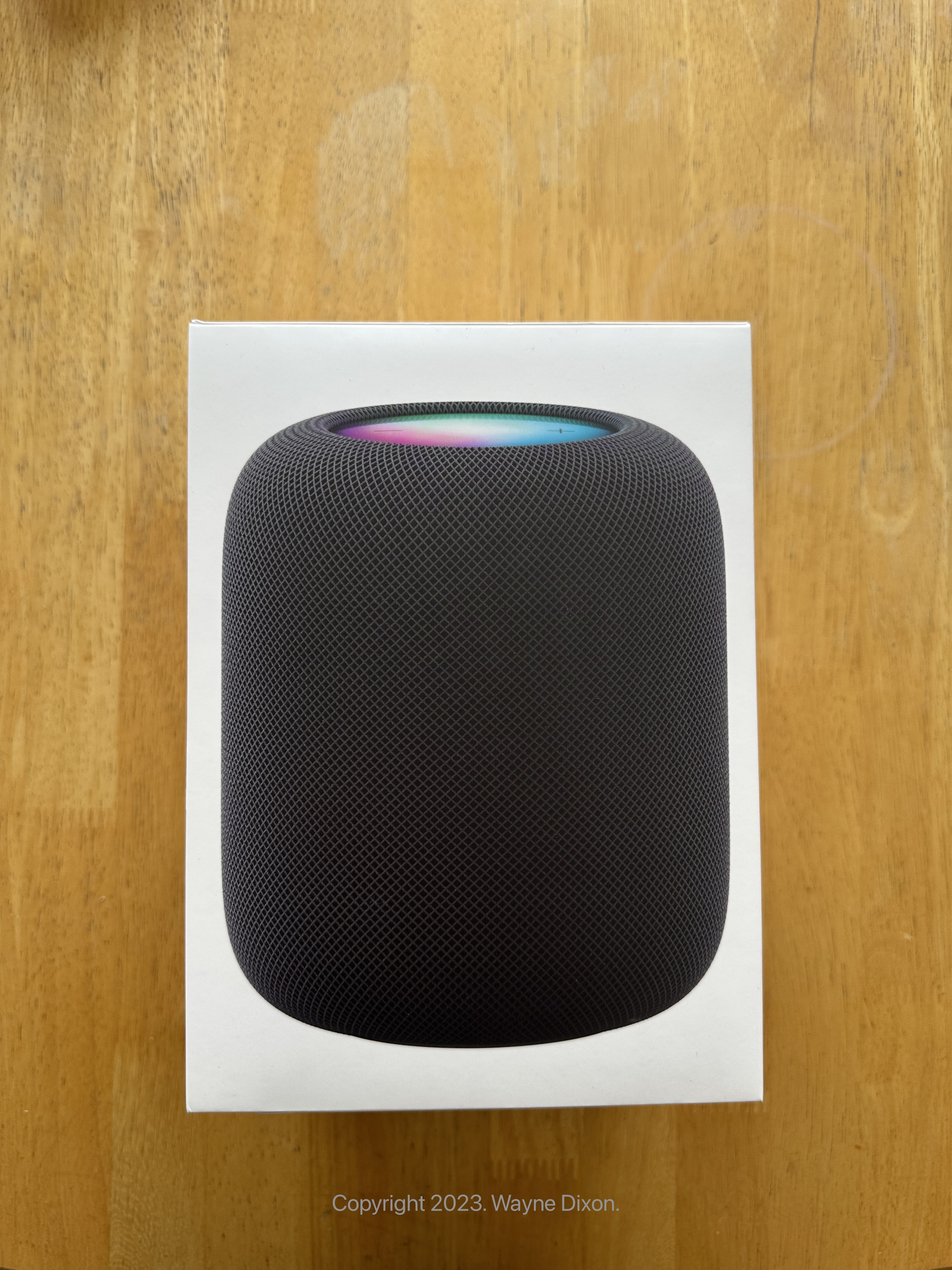 A photo of the 2nd generation HomePod in the box.